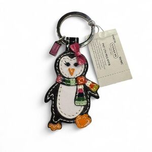 Coach Penguin Keychain with Pink and Orange Details